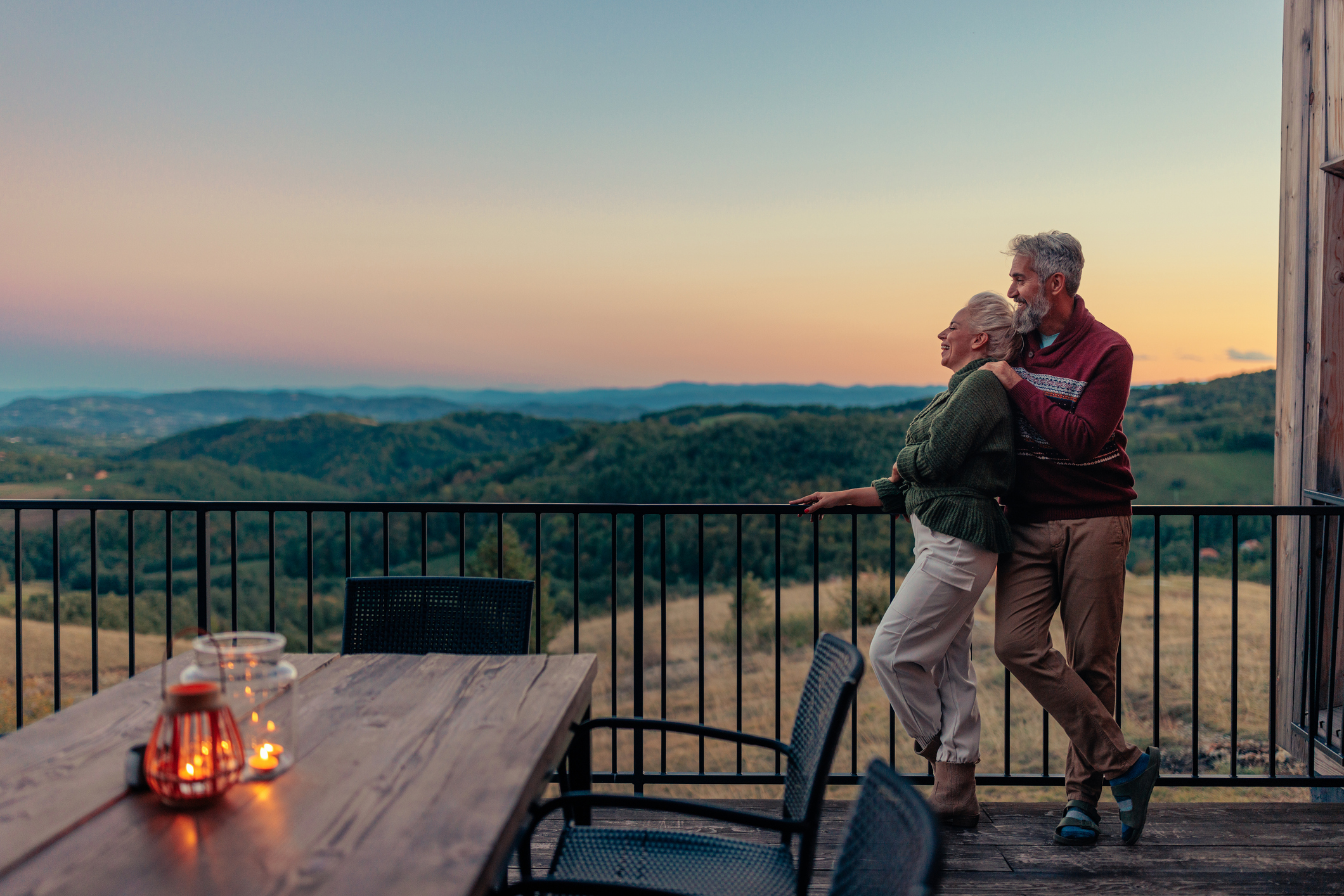 Retired couple at mountain getaway. a couple relaxing after selling a business<br />